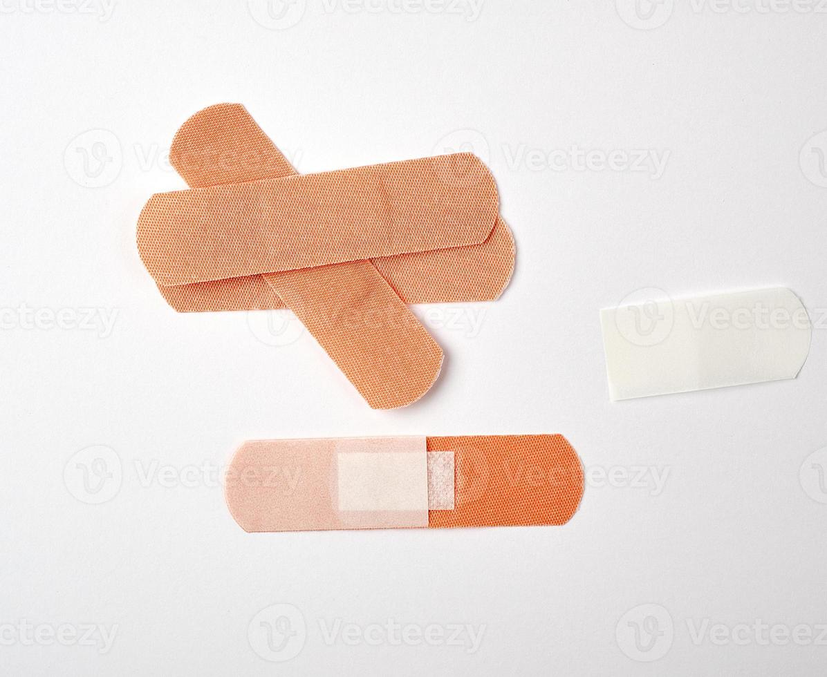 brown textile sticky patch for wounds on the skin photo