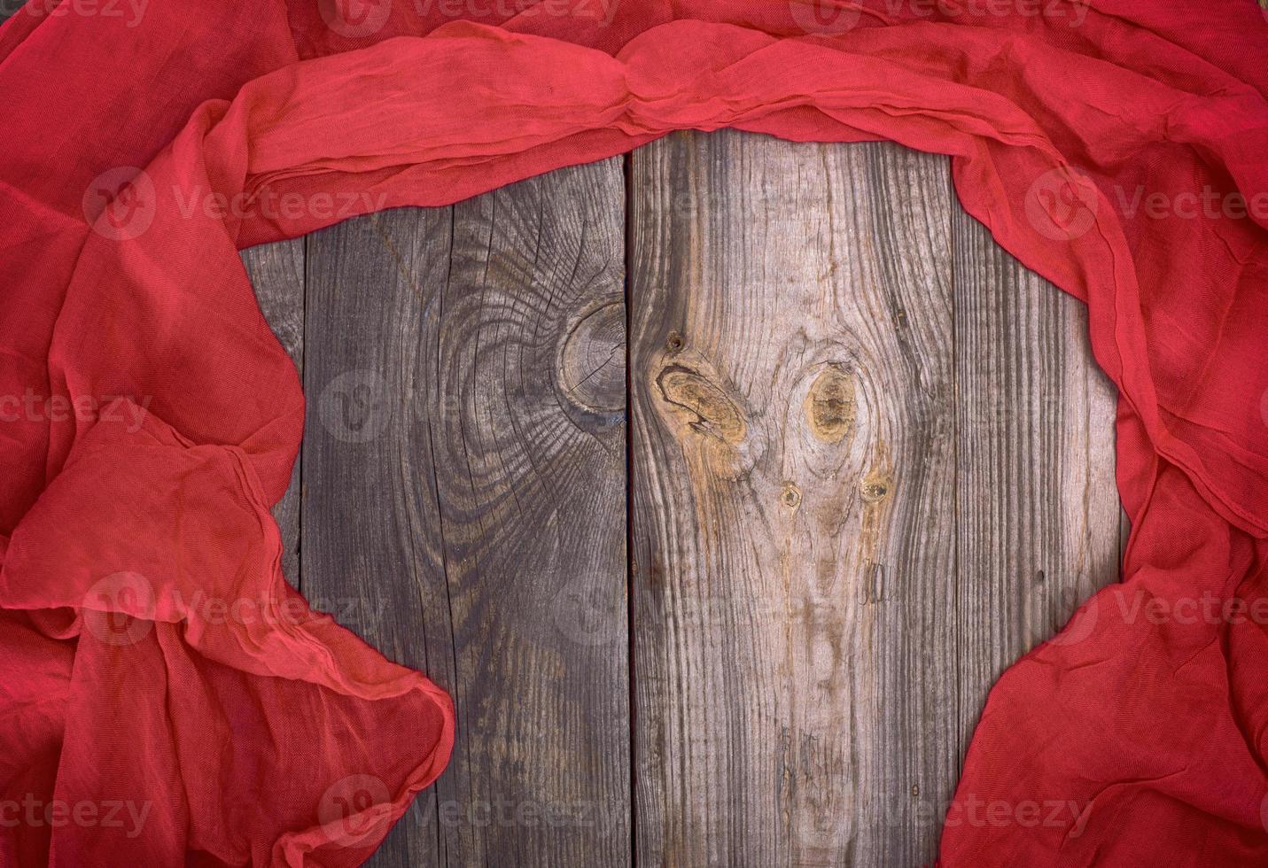 abstract gray wood background and red scarf photo