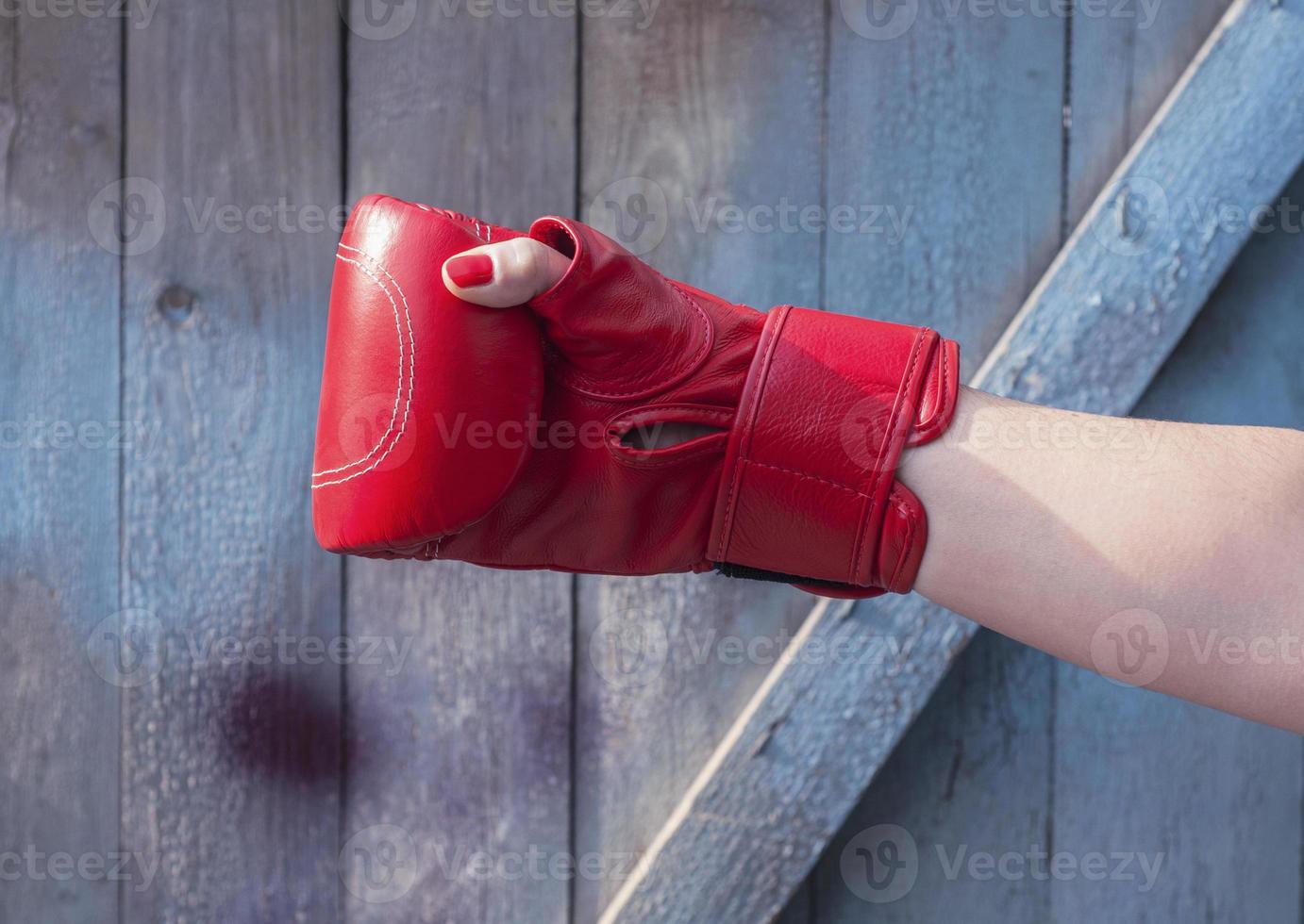 Right hand female in a red boxing glove photo