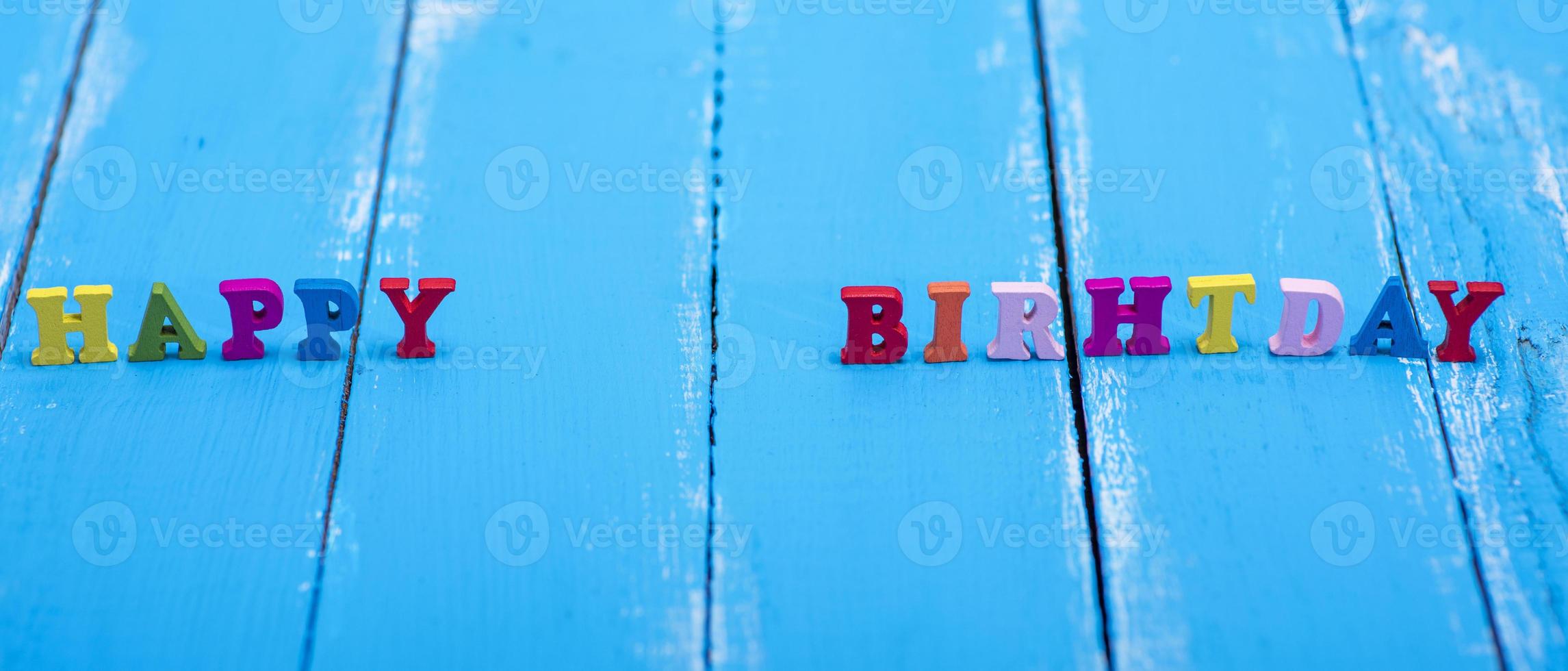 inscription made of wooden letters happy birthday photo
