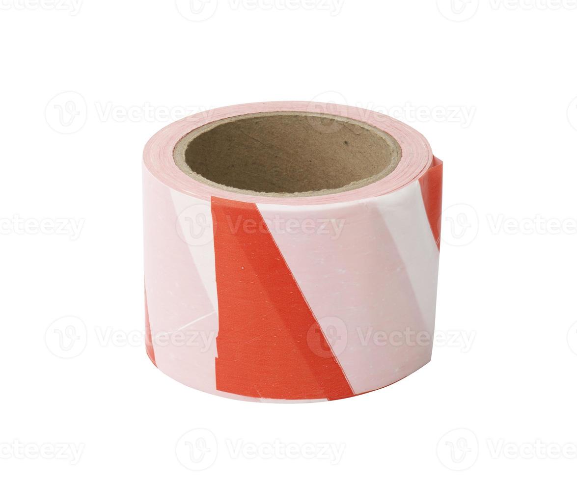 a skein of red and white safety tape on a white background photo