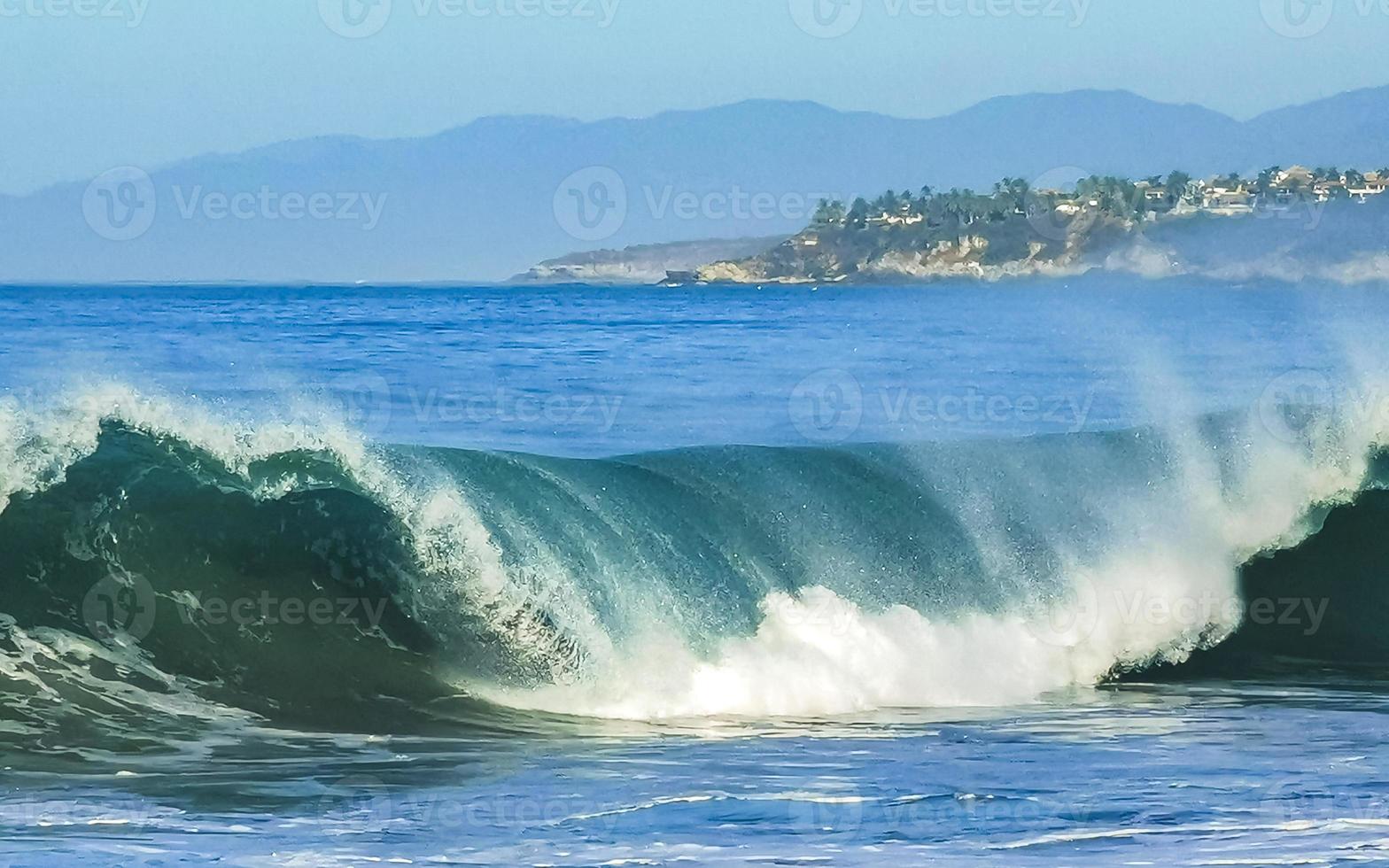 Extremely huge big surfer waves at beach Puerto Escondido Mexico. photo