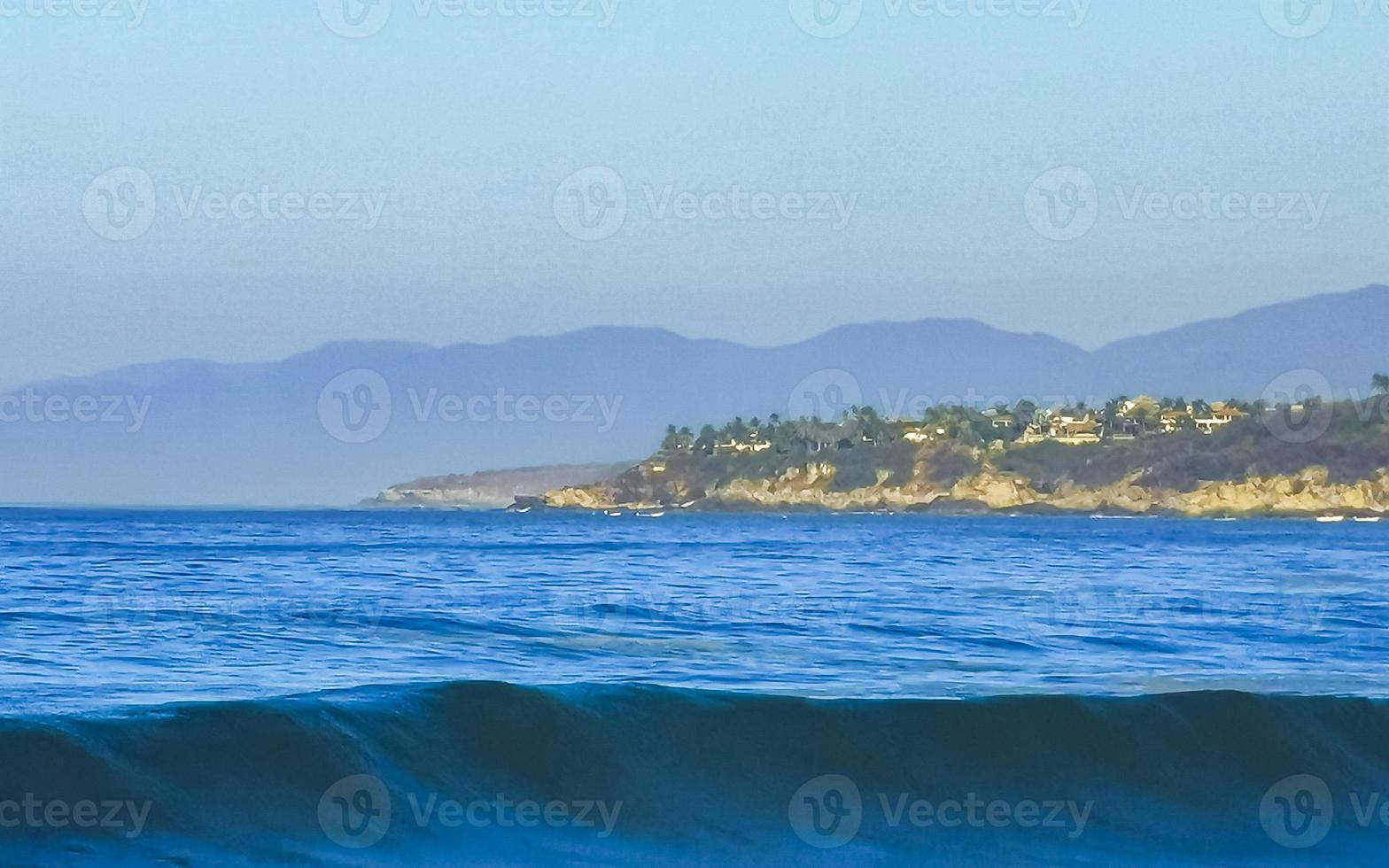 Extremely huge big surfer waves at beach Puerto Escondido Mexico. photo