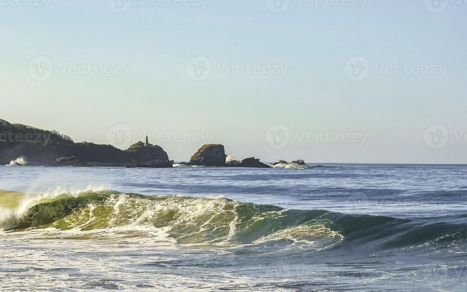 Extremely huge big surfer waves beach La Punta Zicatela Mexico. photo