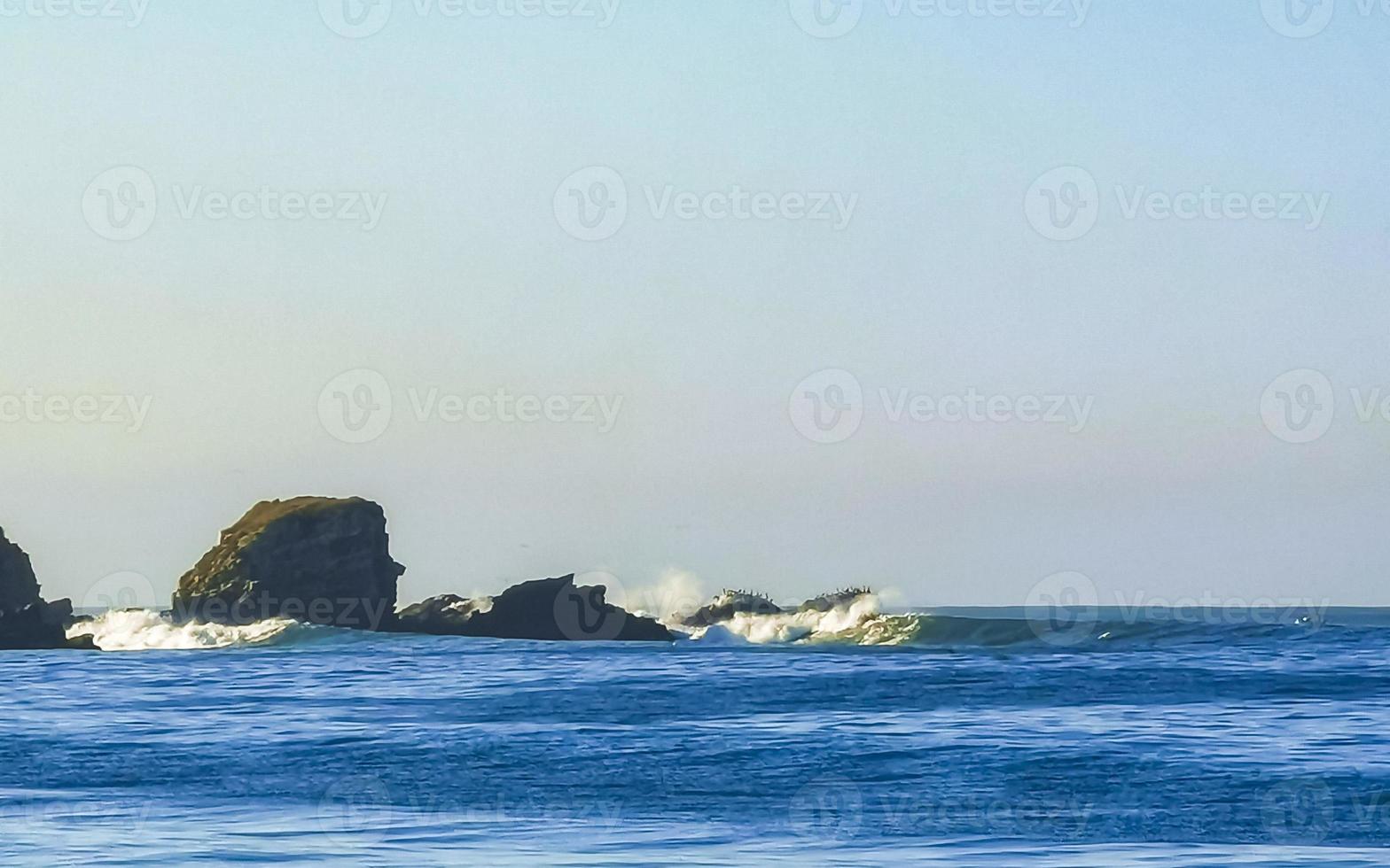 Extremely huge big surfer waves beach La Punta Zicatela Mexico. photo