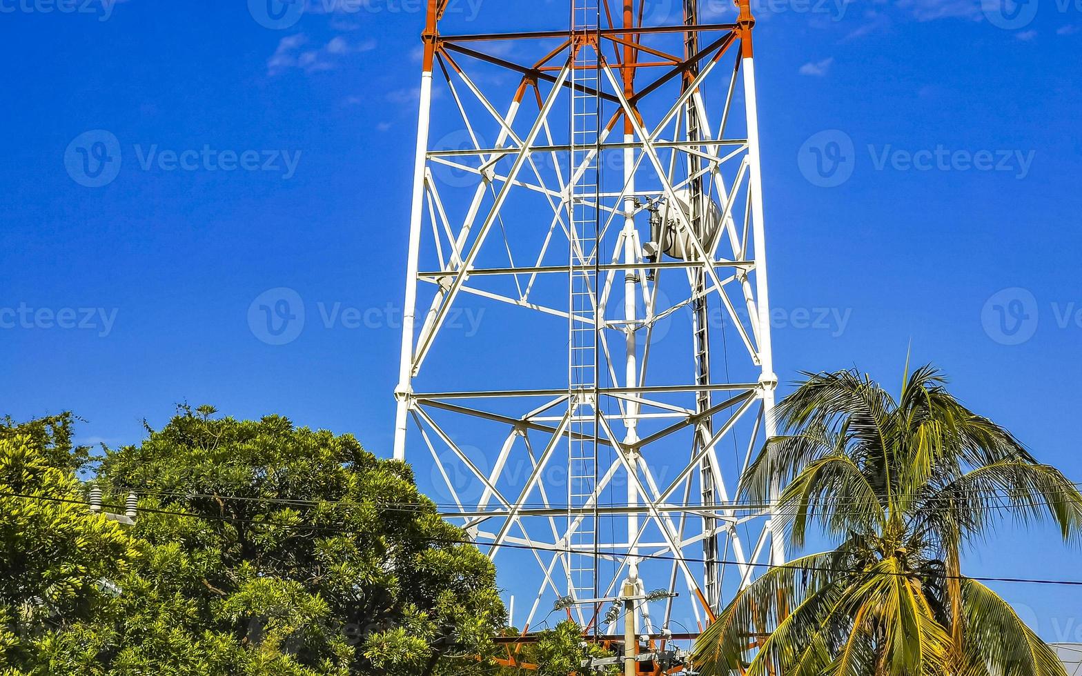 Red white 5G tower radiation in Puerto Escondido Mexico. photo