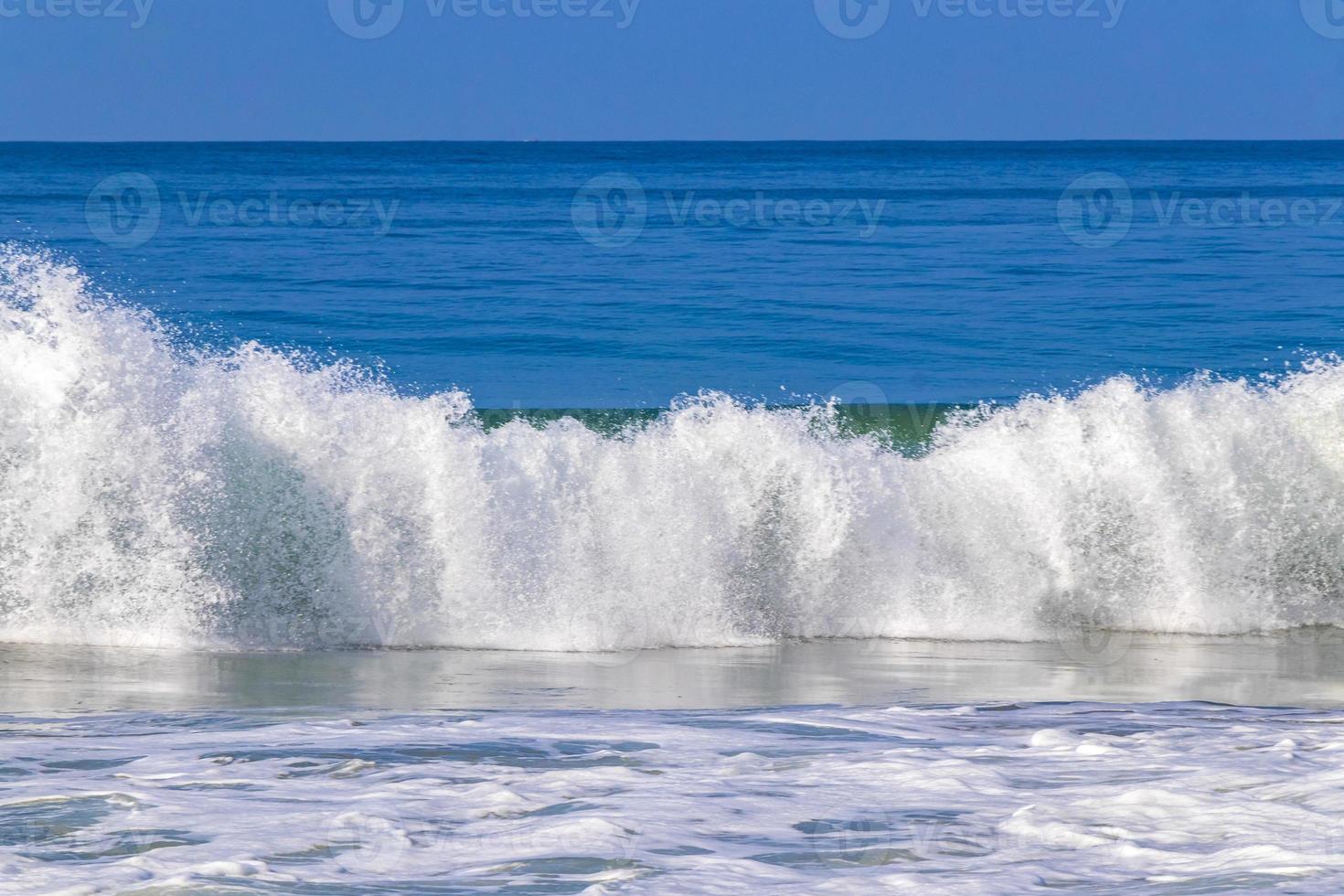 Extremely huge big surfer waves at beach Puerto Escondido Mexico. photo