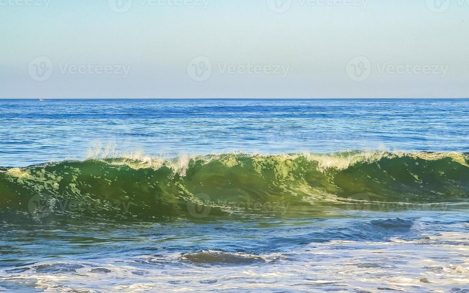 Extremely huge big surfer waves at beach Puerto Escondido Mexico. photo