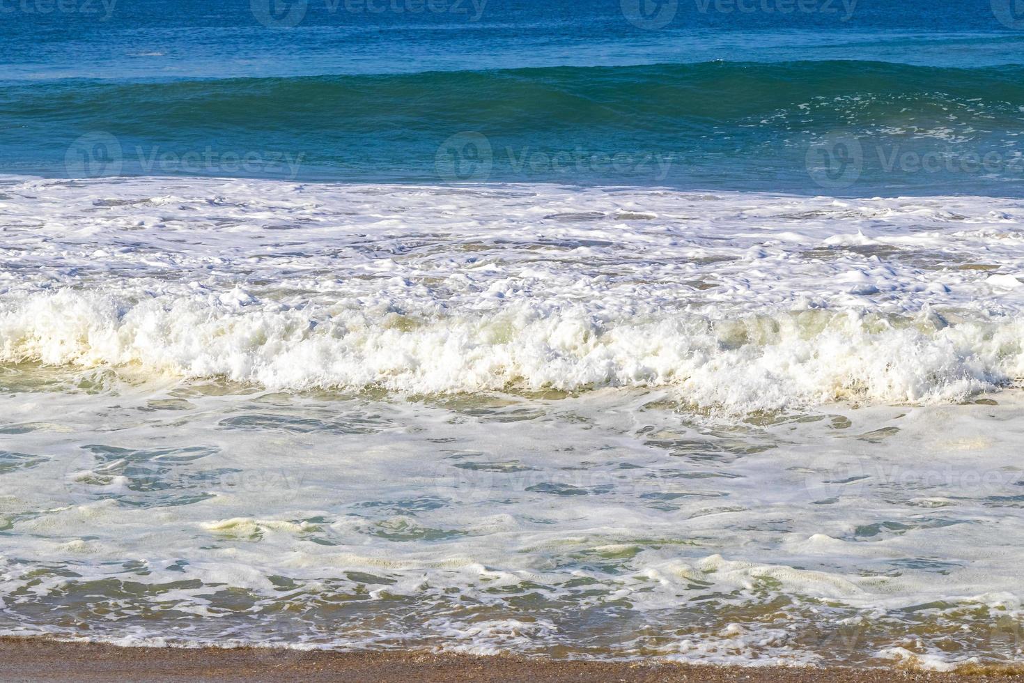 Extremely huge big surfer waves at beach Puerto Escondido Mexico. photo