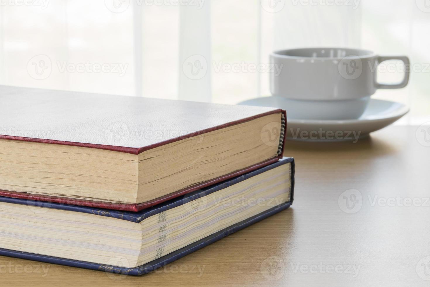 Book and coffee cup photo