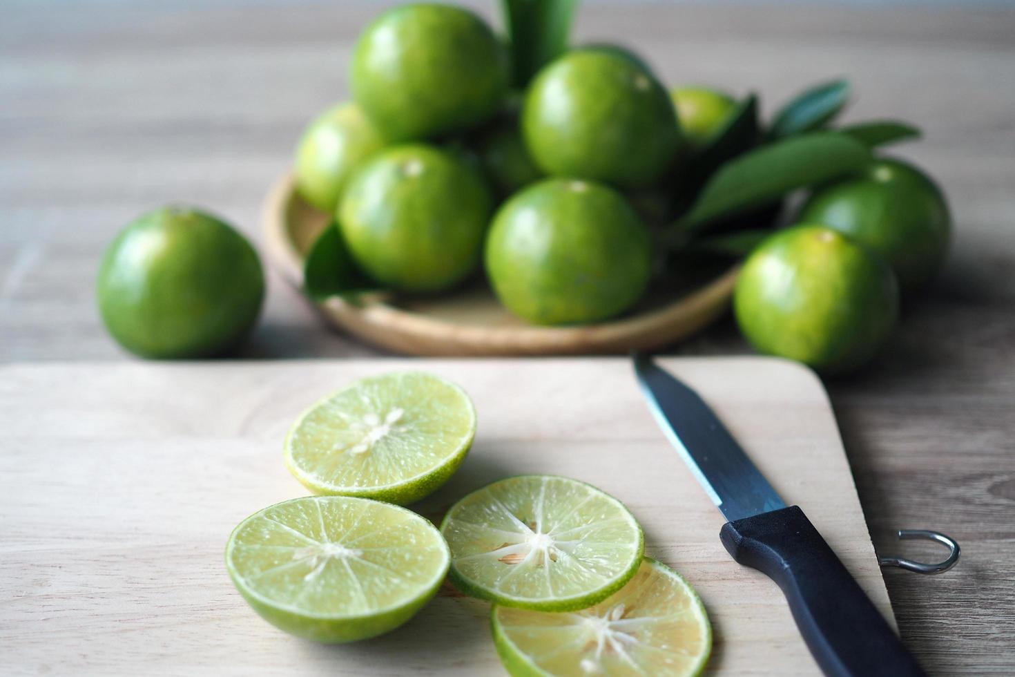 The sliced lemon is put on a cutting board. photo