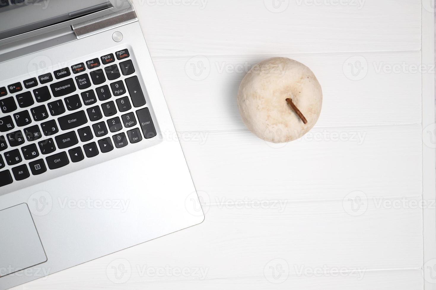 Laptop on table, top view, copy space photo