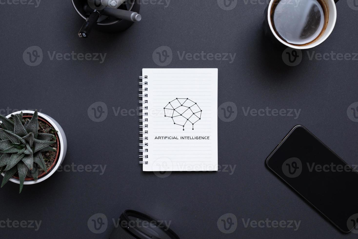 Brain drawn in a notebook of network nodes and the artificial intelligence text. The concept of using artificial intelligence for writing texts and doing business photo