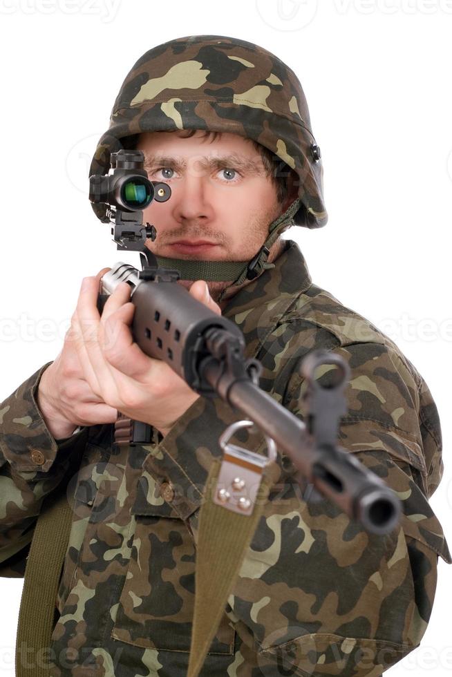 Soldier keeping a rifle photo