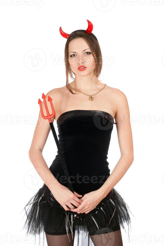 Beautiful girl is wearing a devil costume photo