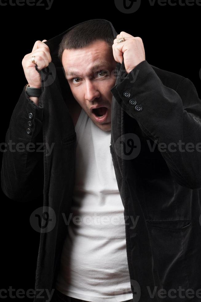 Portrait of a frightened man. Isolated photo