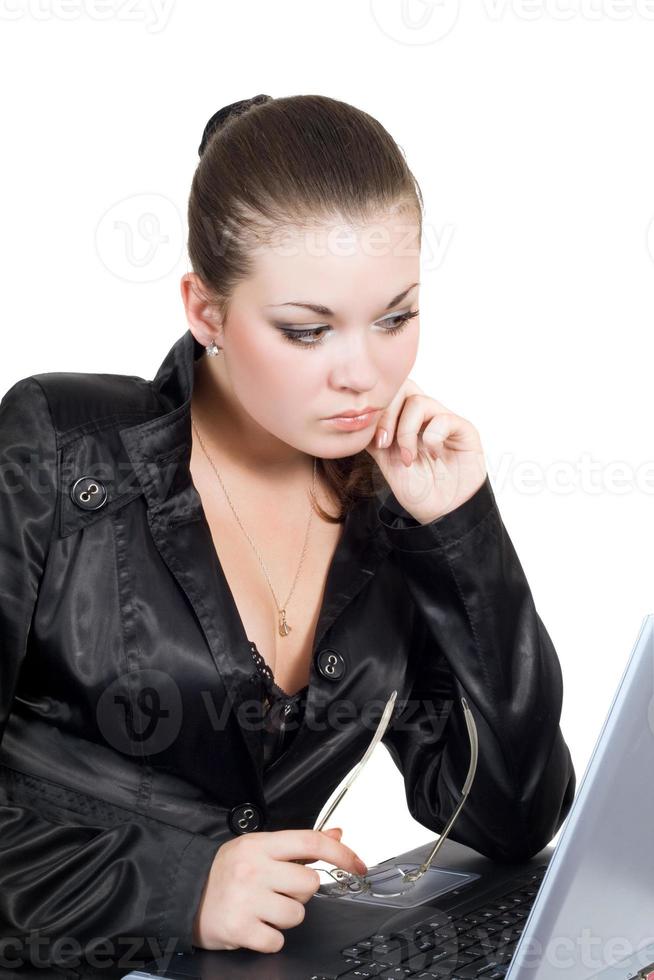 Businesswoman with laptop. Isolated on a white photo