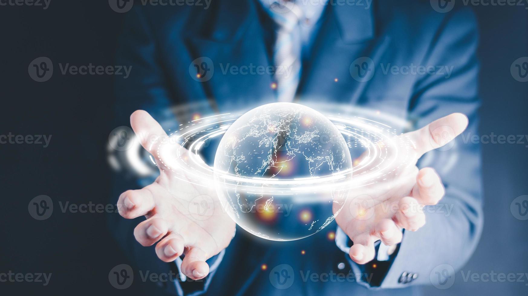 businessman holding Global network connection. Big data analytics and business intelligence concept. World map point and line composition concept of global business.Digital link tech. photo