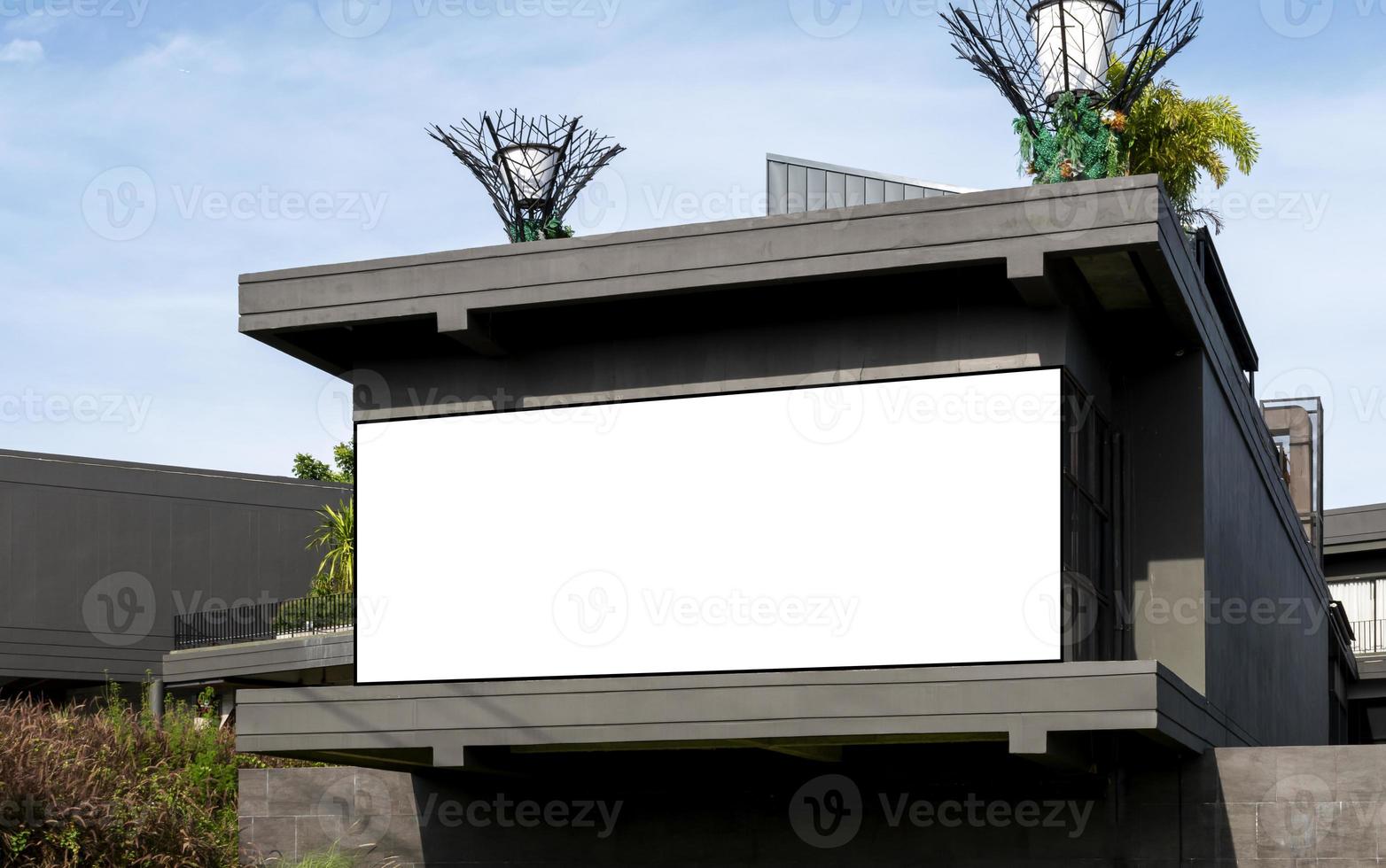 Mock up white background billboard on building .clipping path for Mockup photo