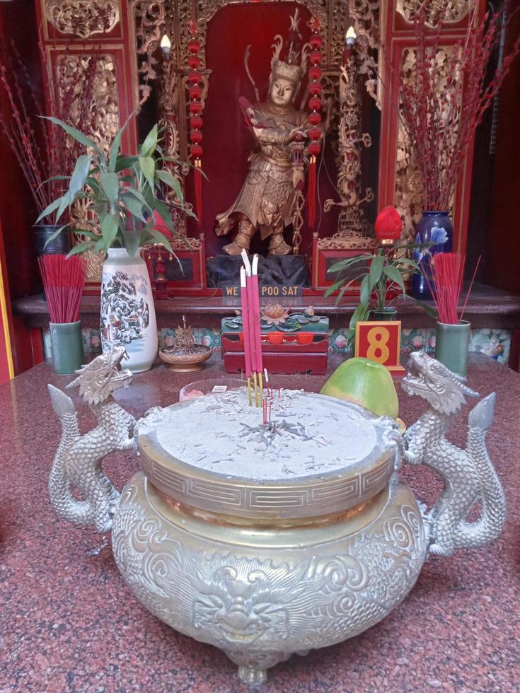 Malang, Indonesia, on January-07-2023. Excitement on Chinese new year eve. Eng An Kiong Temple, a place of worship for three religions, Confucianism, Taoism and Buddhism. photo