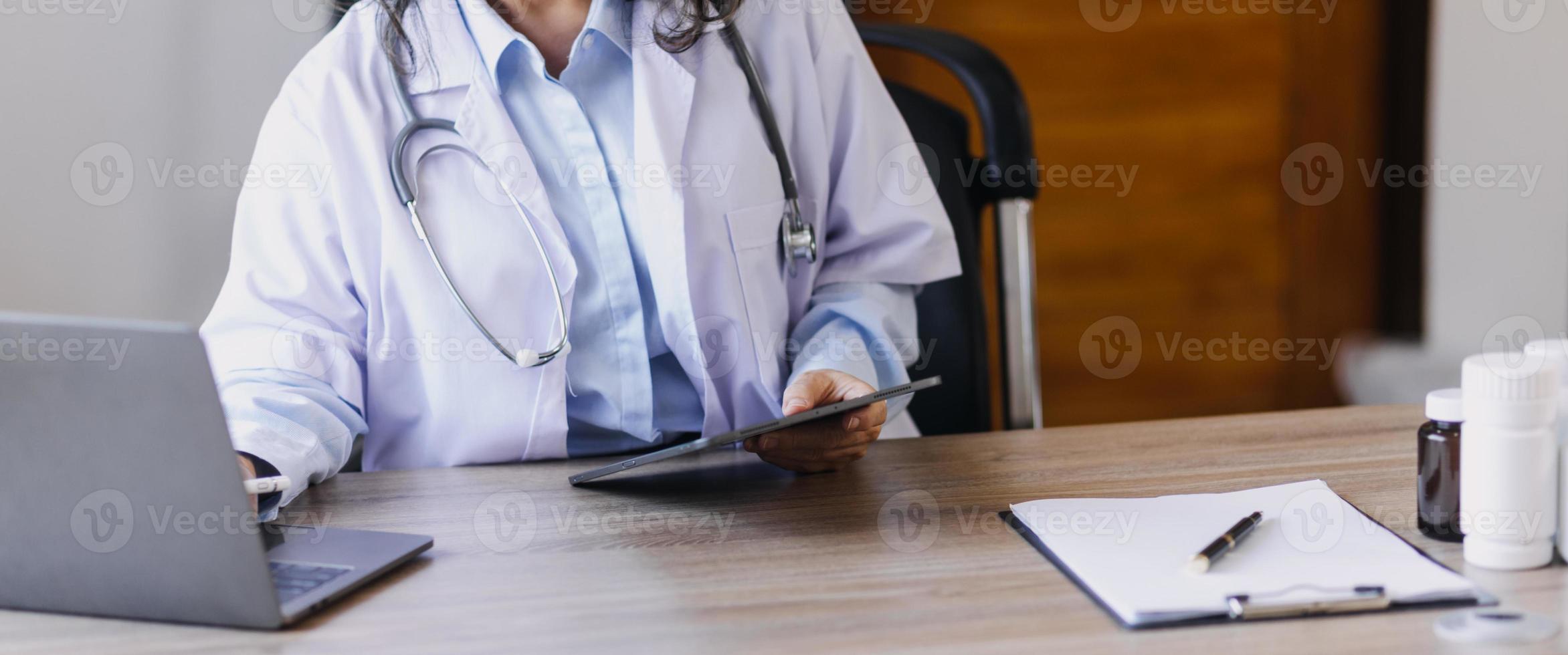 Homecare nursing service and elderly people cardiology healthcare. Close up of young hispanic female doctor nurse check mature caucasian man patient heartbeat using stethoscope during visit photo