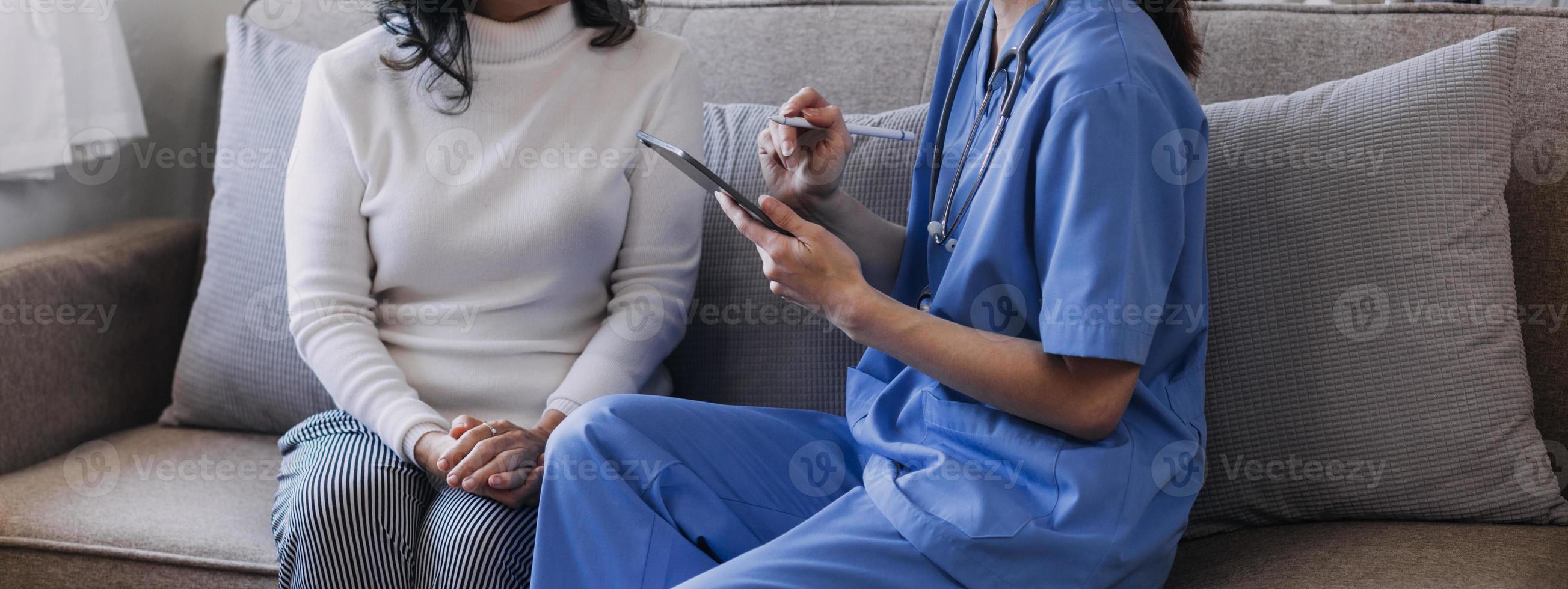 Homecare nursing service and elderly people cardiology healthcare. Close up of young hispanic female doctor nurse check mature caucasian man patient heartbeat using stethoscope during visit photo