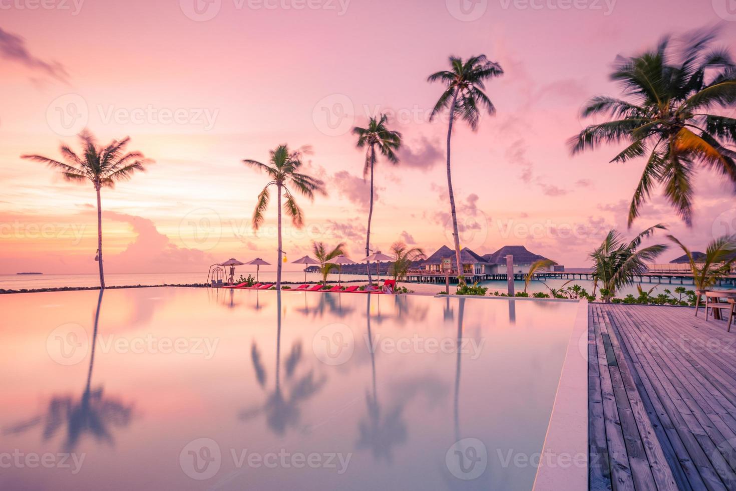 Beautiful poolside and sunset sky. Luxurious tropical beach landscape ...