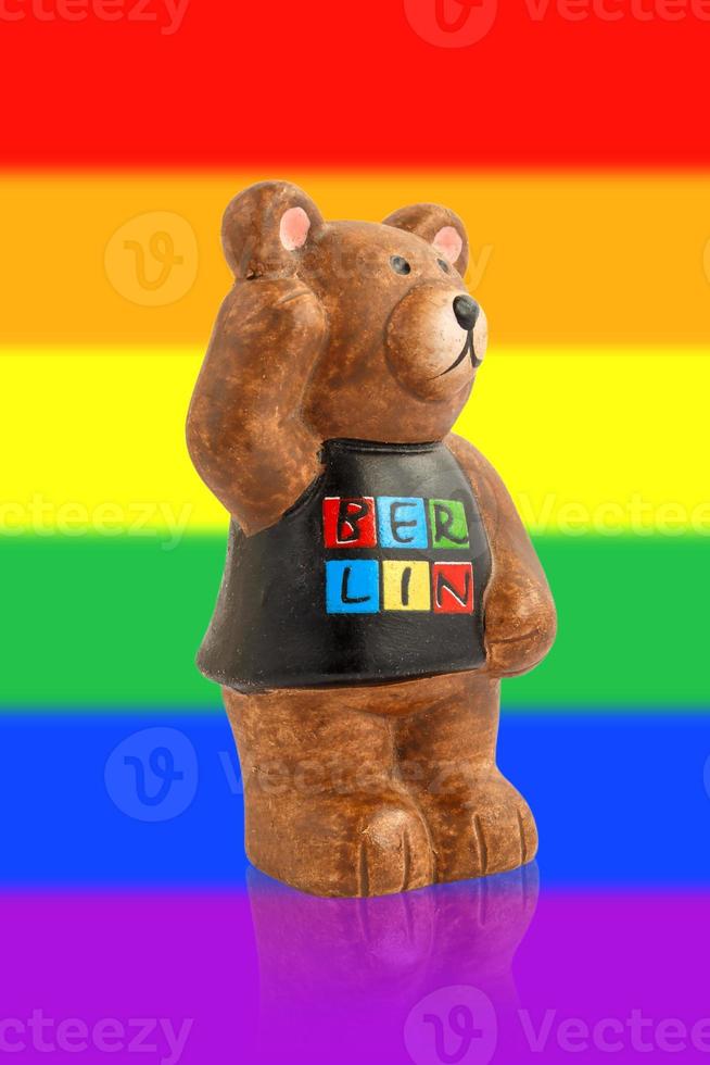 Bear on the background of the rainbow flag. Bear symbol of Berlin. photo