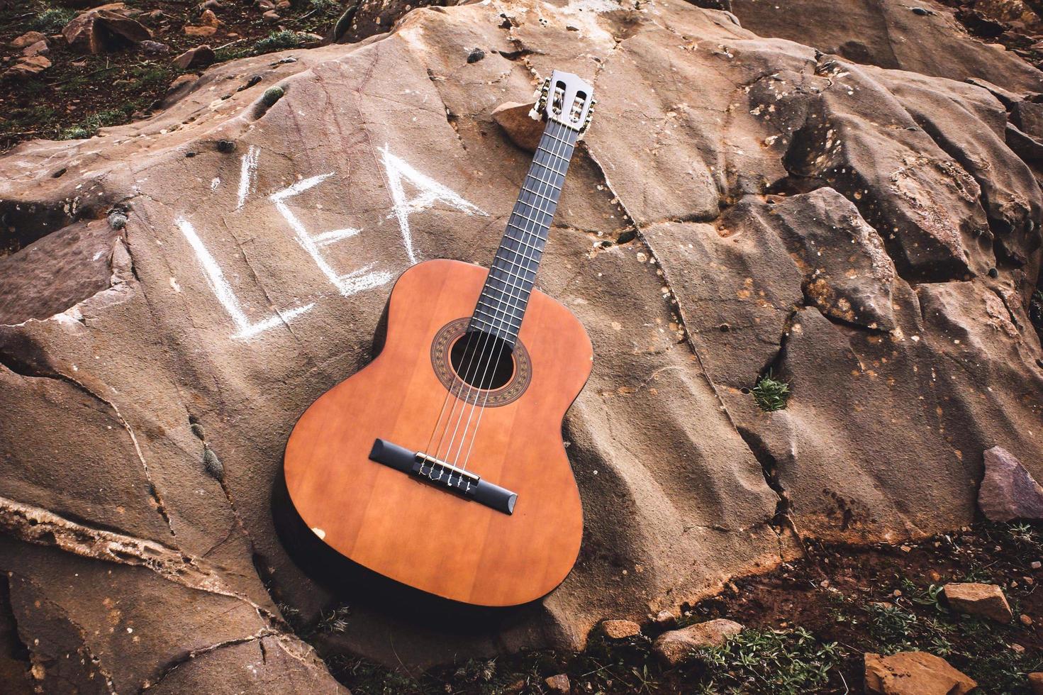 Classical guitar among the rocks photo