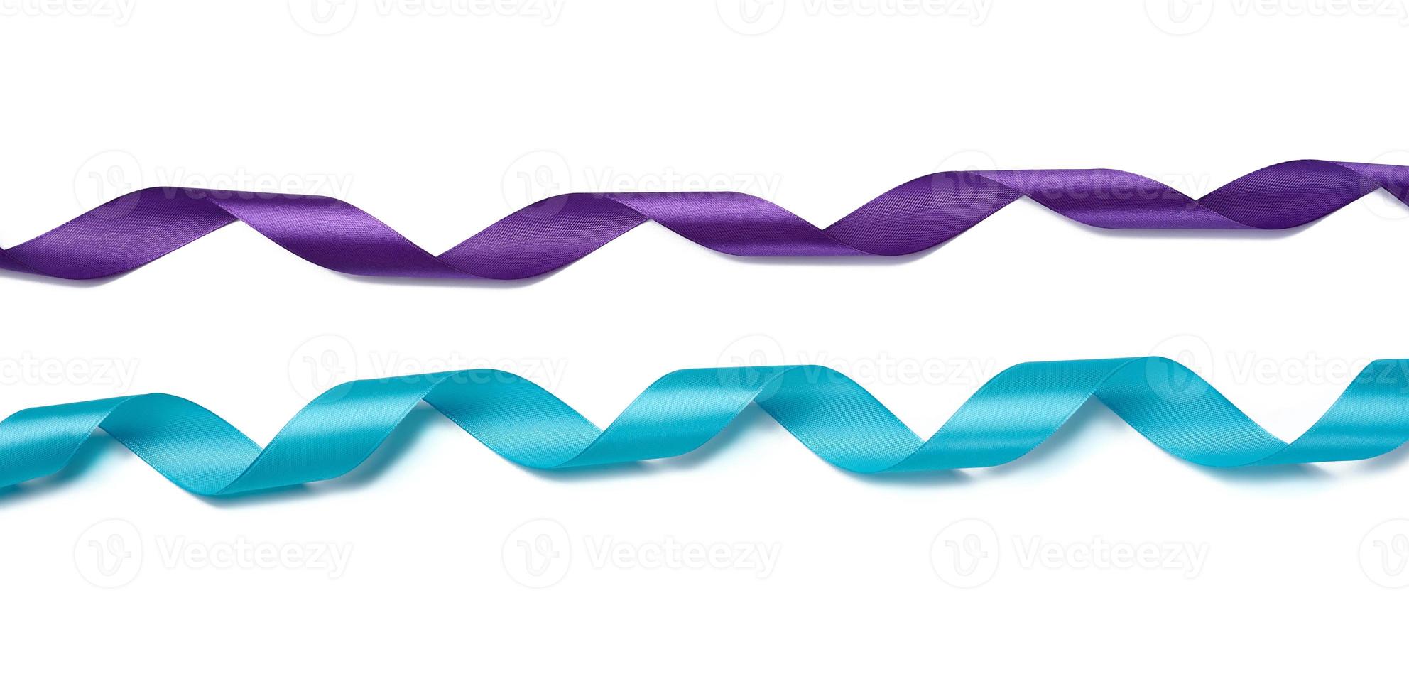 Twisted silk blue and purple ribbons for decoration on a white isolated background photo