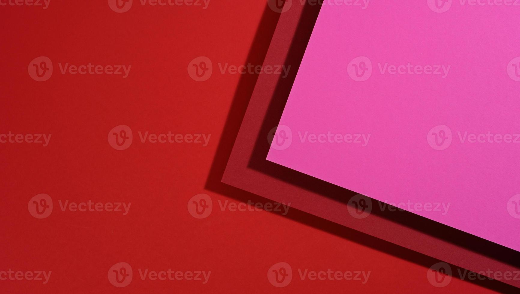 modern pink-red background with sheets of paper with shadow. Template for business photo