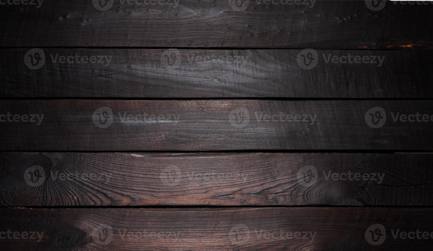 Background of old brown wooden boards with cracks, scuffs. Backdrop for compositions, rustic photo