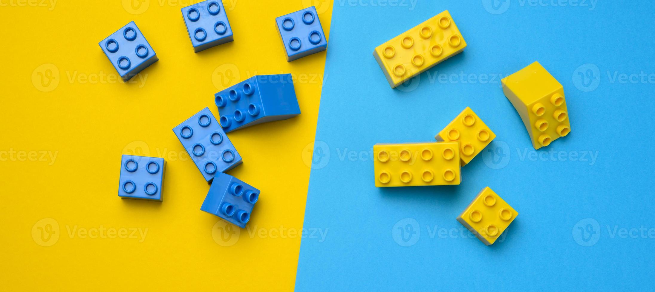 Plastic yellow-blue details of the children's designer. Children's educational game, top view photo