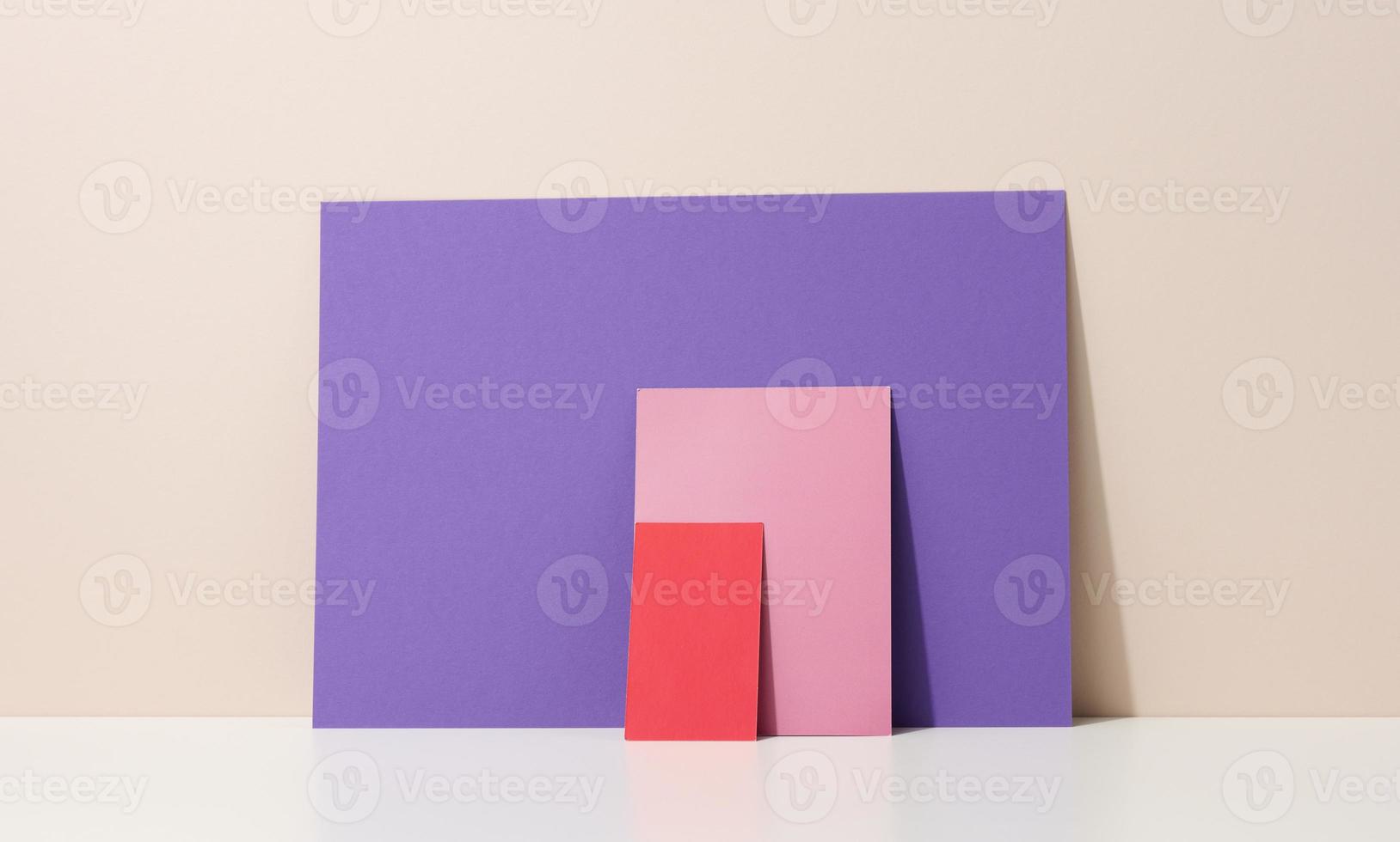 blank purple, pink cardboard sheet of paper with shadow on white table. Template for flyer, announcement photo