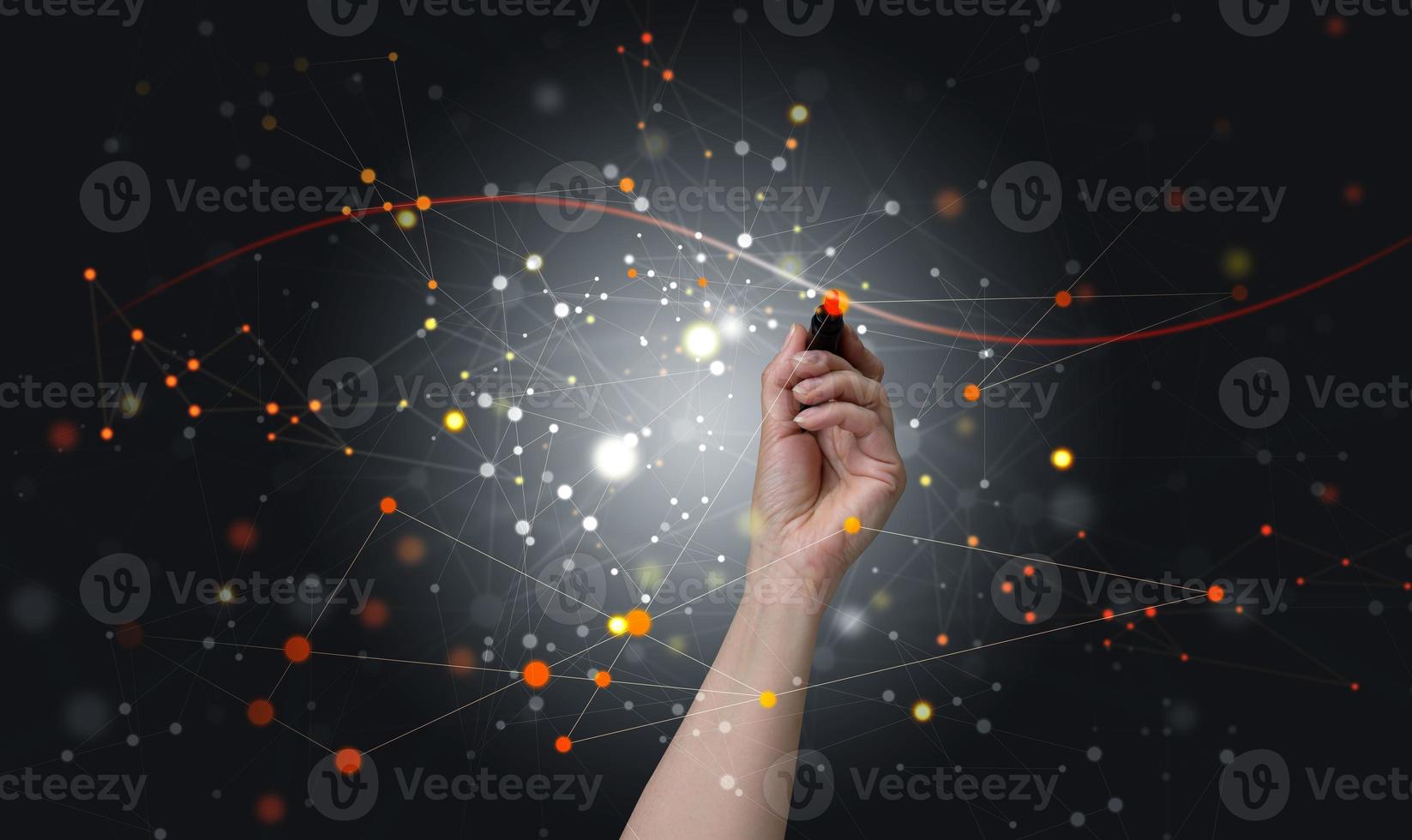 female hand holds a marker and draws connections in the structure of the global network for the exchange of information between users. Global business network concept photo