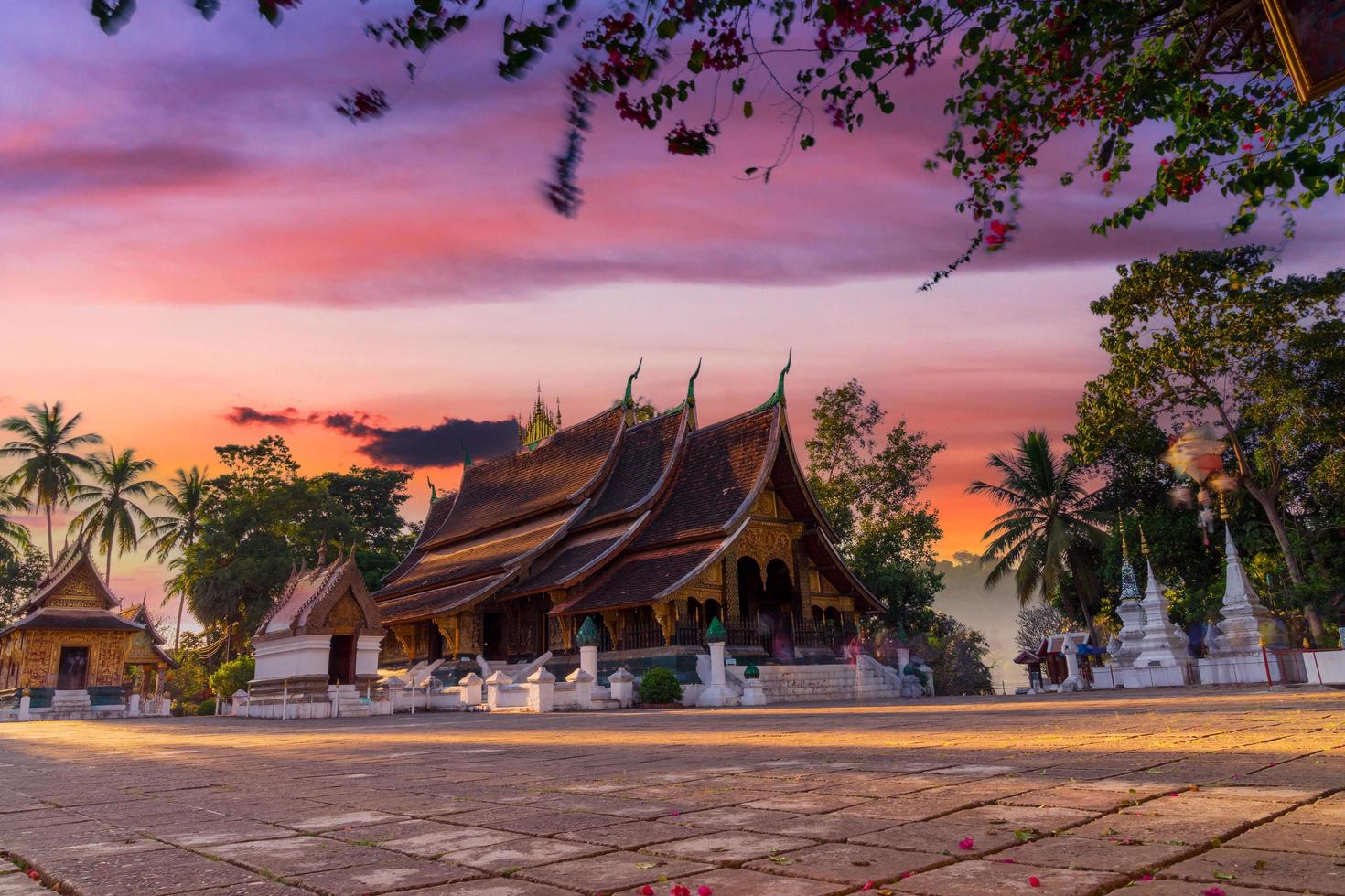 Wat Xieng Thong Golden City Temple in Luang Prabang, Laos. Xieng Thong temple is one of the most important of Lao monasteries. photo