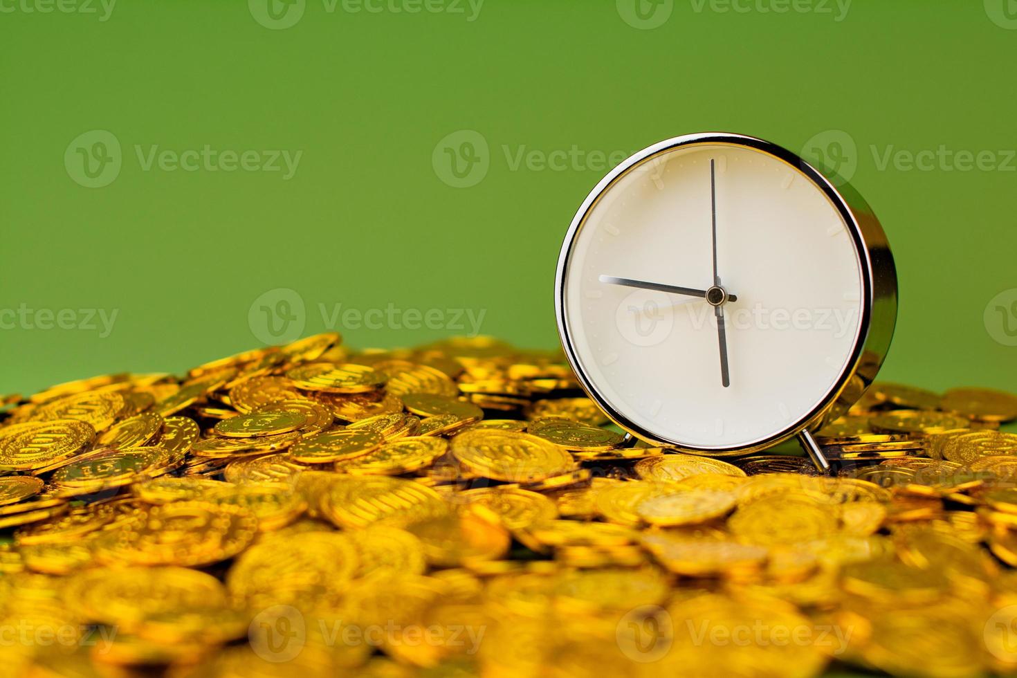 time and gold The idea of saving gold and valuable time. photo