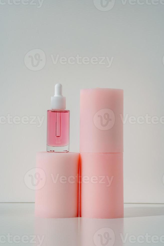 pink face oil and candles photo