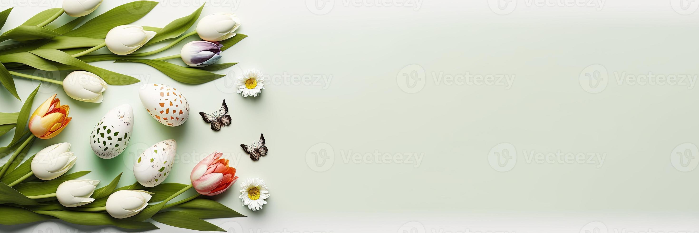 Decorated Tulips and Eggs On a Soft Green Background for An Easter Celebration Banner photo