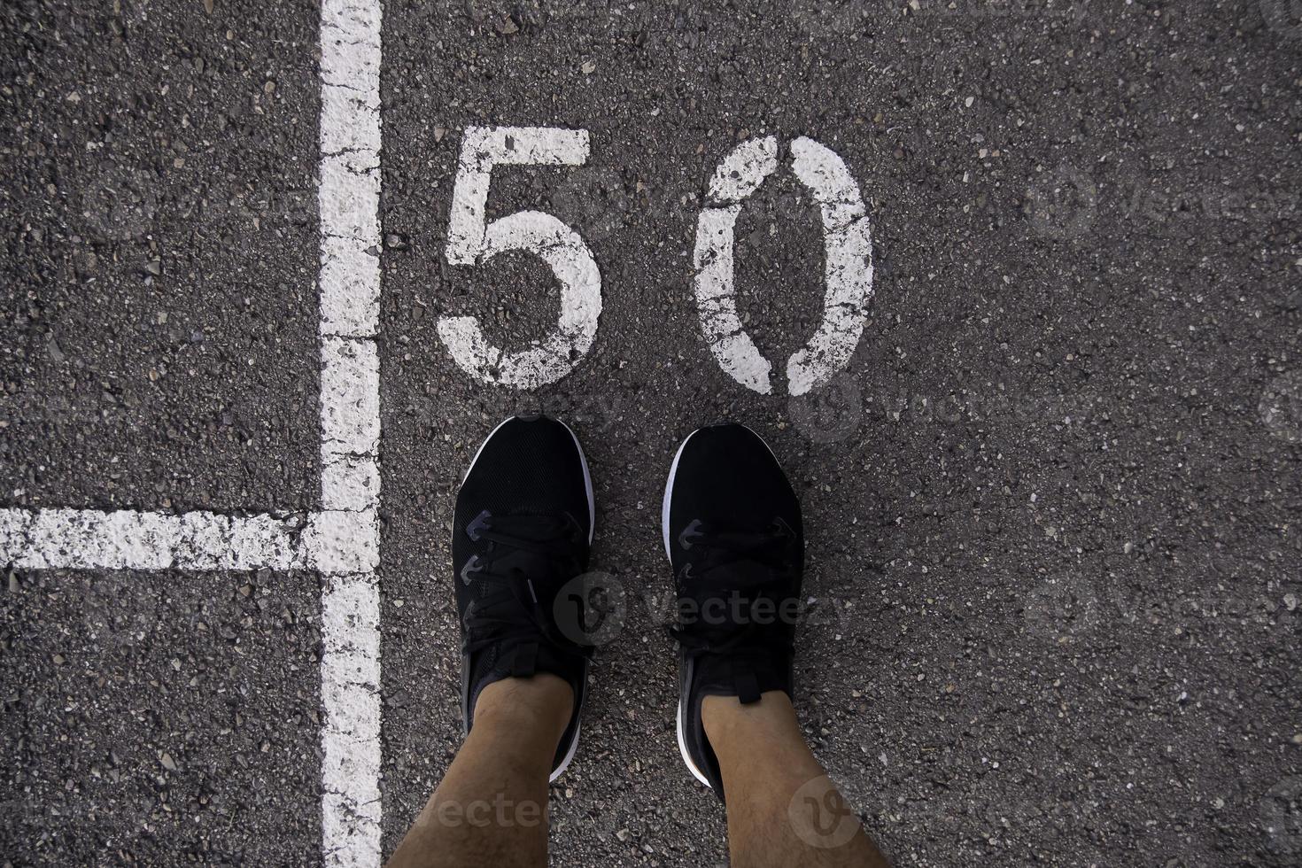 Feet on running track photo