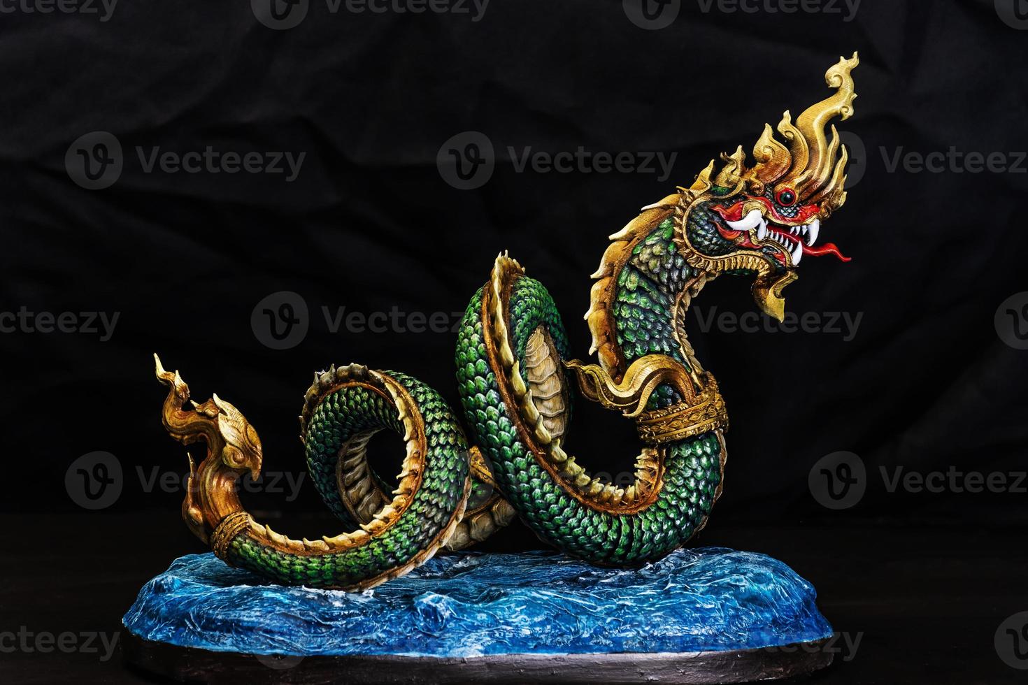 King of naga, naka  Thailand dragon or serpent king in the dark photo