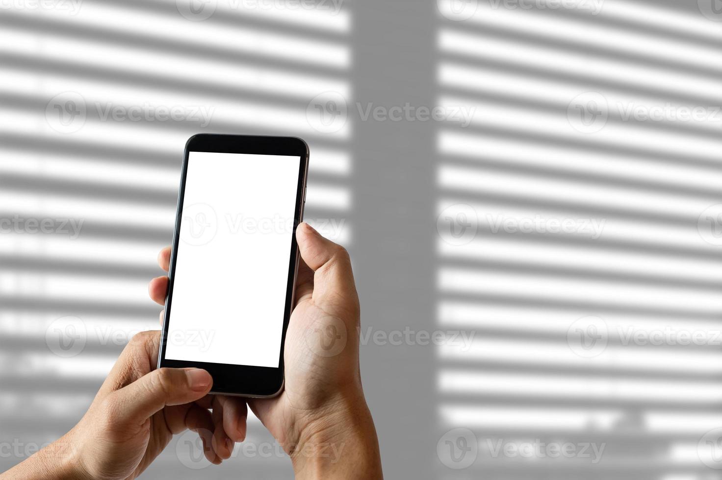 Cropped shot of a woman using blank screen tablet with stylus in modern office photo