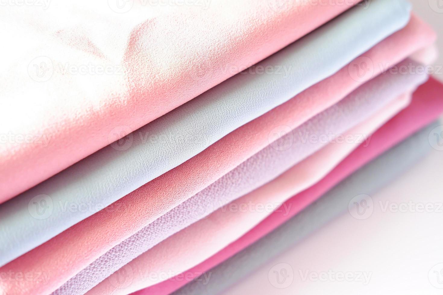 various beautiful and attractive fabrics folded neatly photo