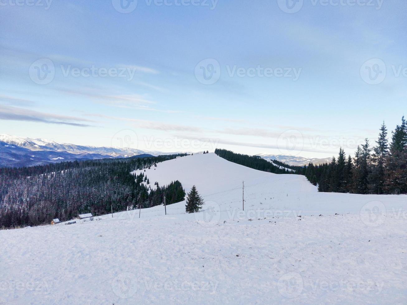 Winter landscape of snowy mountains photo