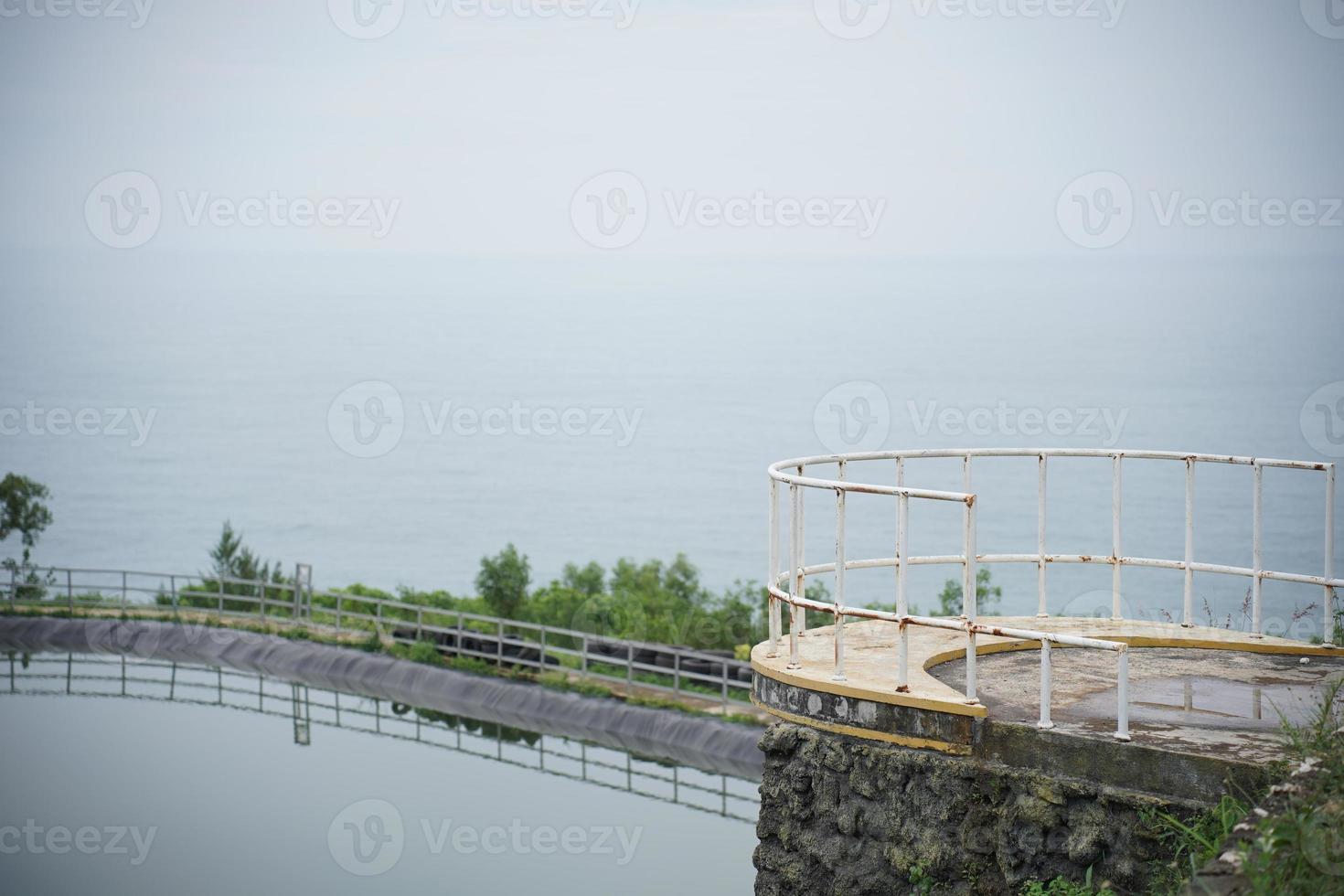 Grigak Reservoir in Gunungkidul, Yogyakarta, Indonesia. Become a rainwater reservoir and a tourist spot by the sea. photo