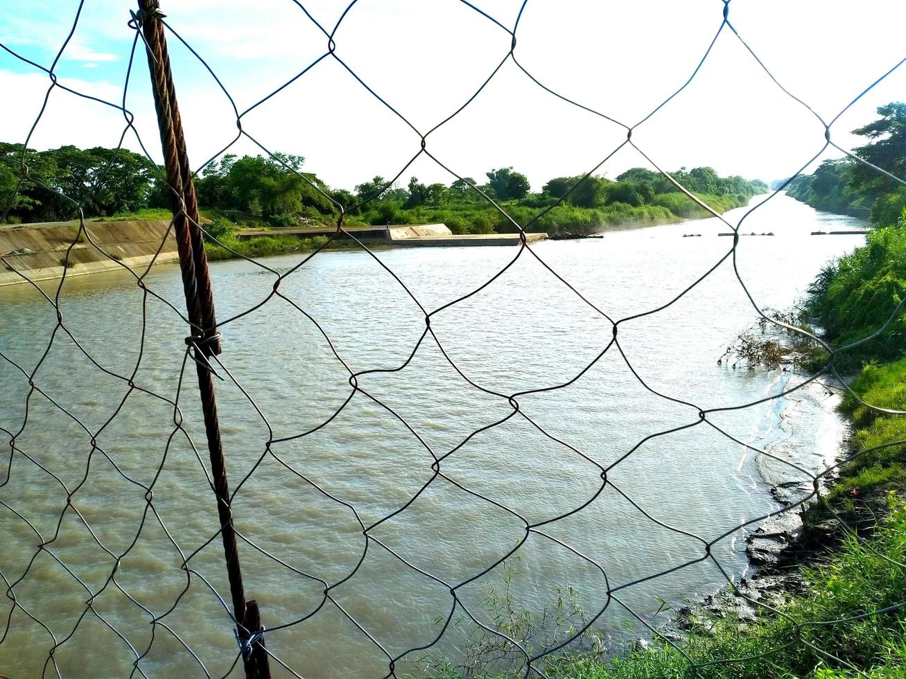 Metal Bridge above the lake photo
