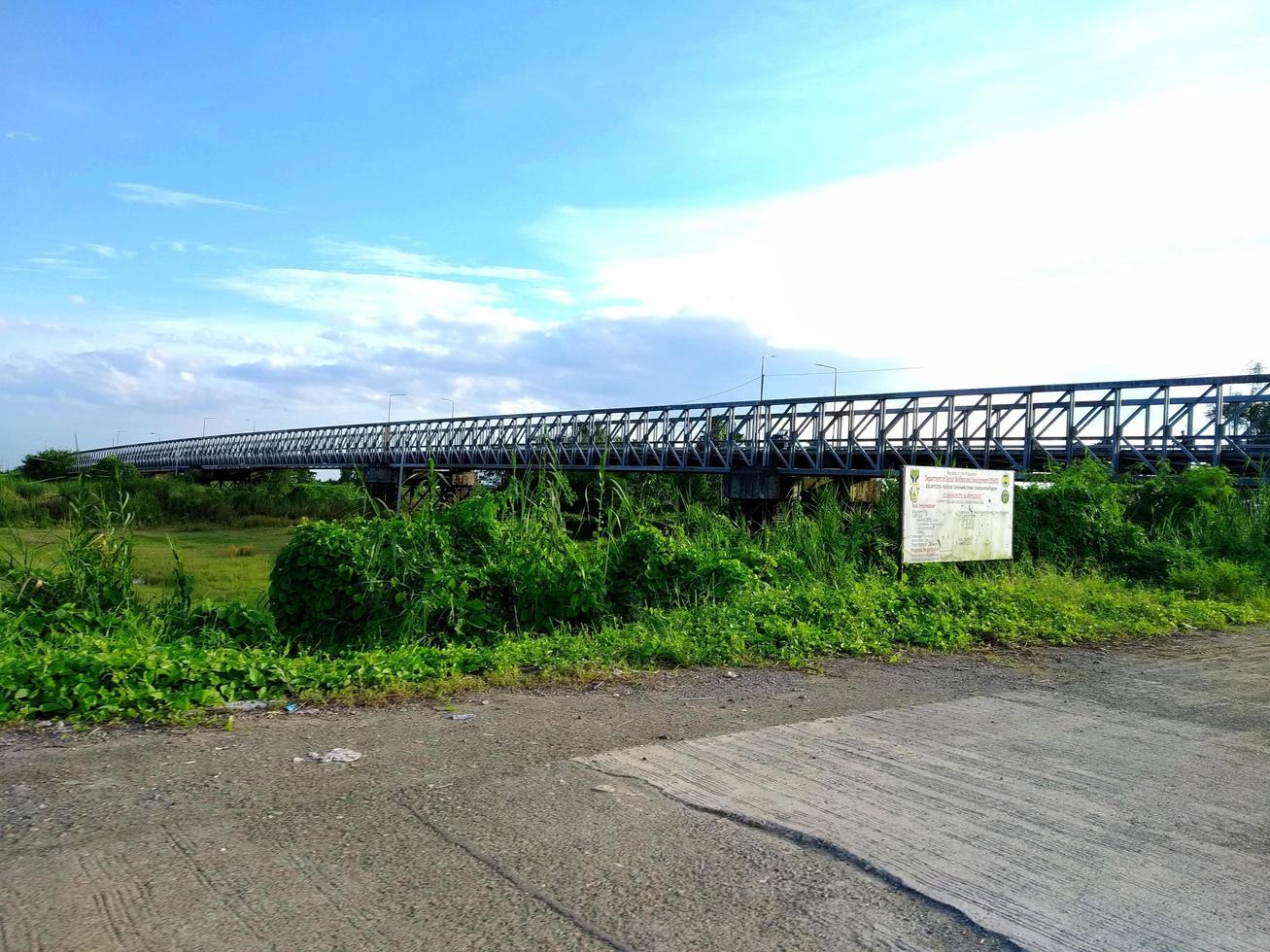 Bridge over the grass view photo