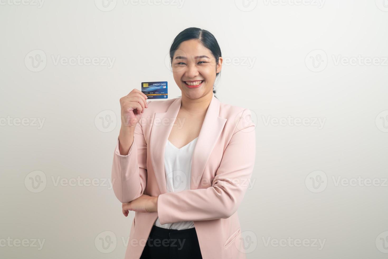 Asian woman holding credit card with white background photo