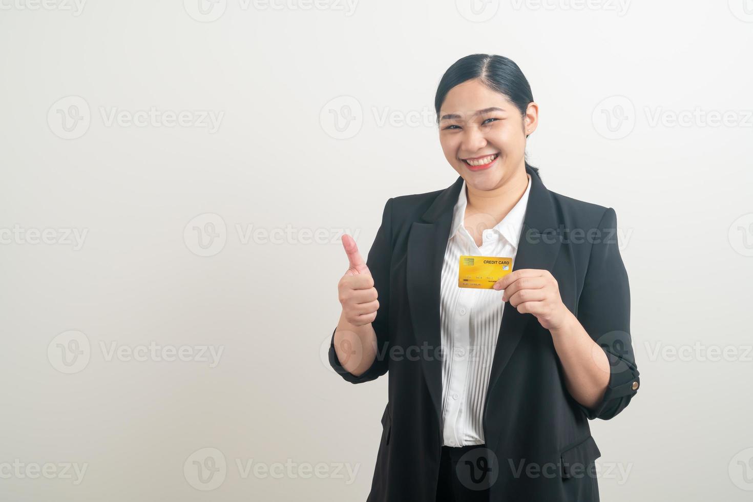 Asian woman holding credit card with white background photo