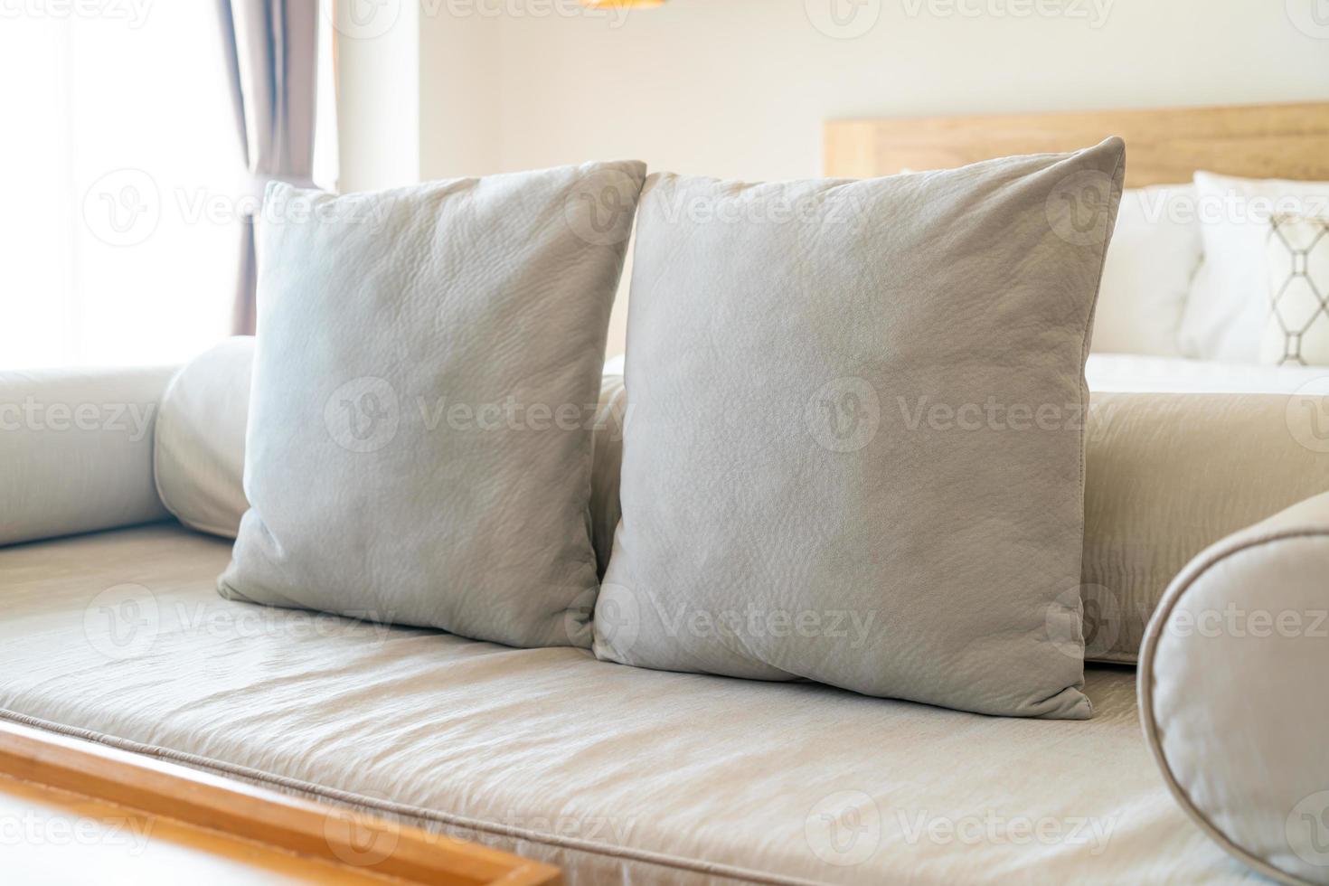 comfortable pillows on end of bed sofa photo